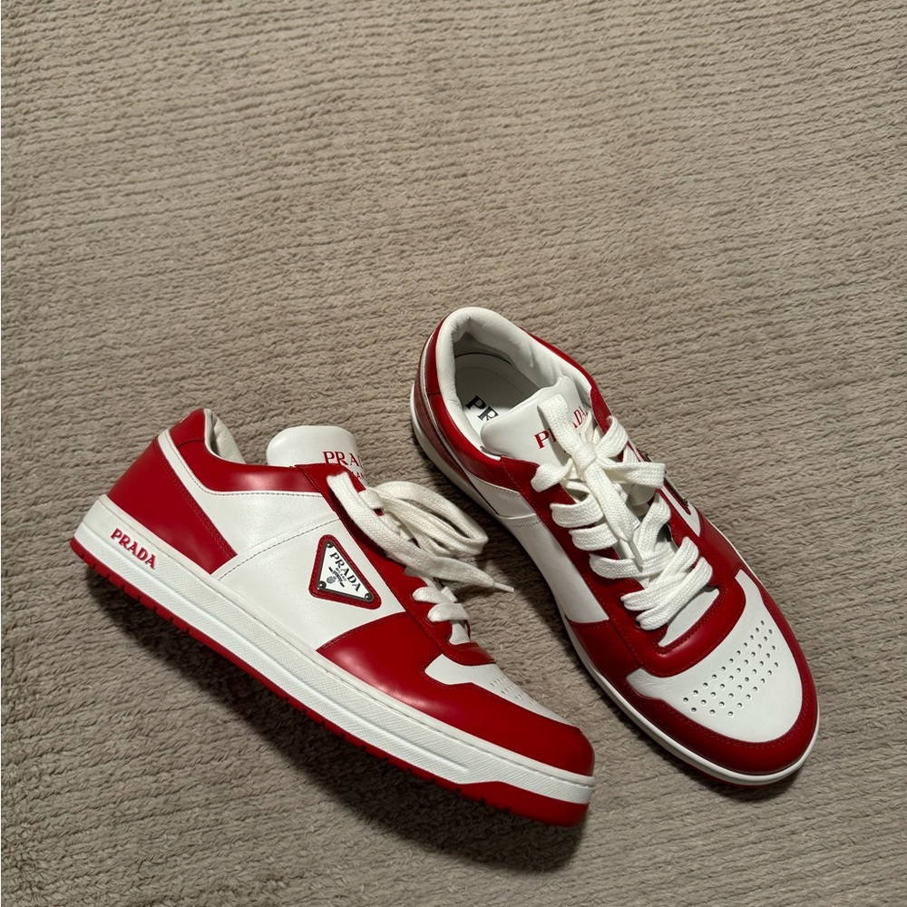 Prada triangle logo-patch low-top sneakers